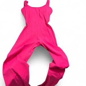 Hot pink jumpsuit with wide leg and elastic waist. Size XL